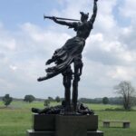 The Spirit Triumphant towers over a casualty from the Washington Artillery of New Orleans.