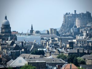The view of Old Town Edinburgh and Edinburgh Castle from high atop Holyrood Park