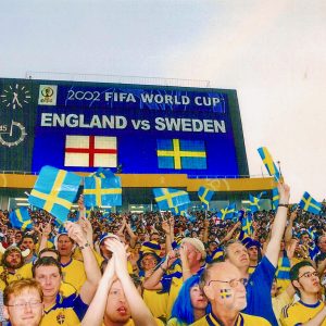 Sweden supporters get revved up in one end zone moments before the World Cup match with England