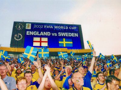 Sweden supporters get revved up in one end zone moments before the World Cup match with England