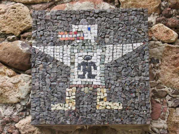 Duck eats man intricate tile mosaic in San Miguel de Allende